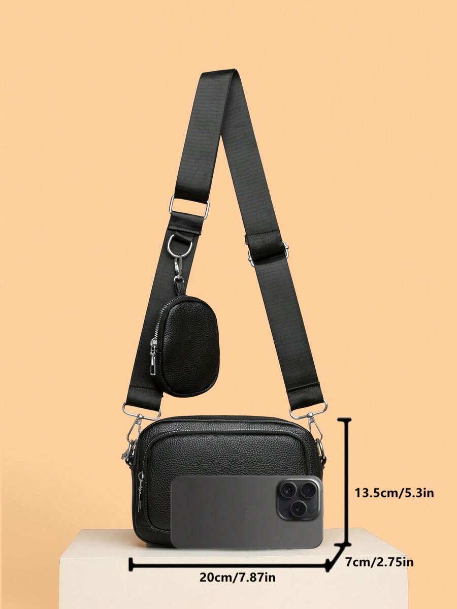 dimension sacoche noir cuir sobre uni avec mini sacoche accrochee a la sangle 