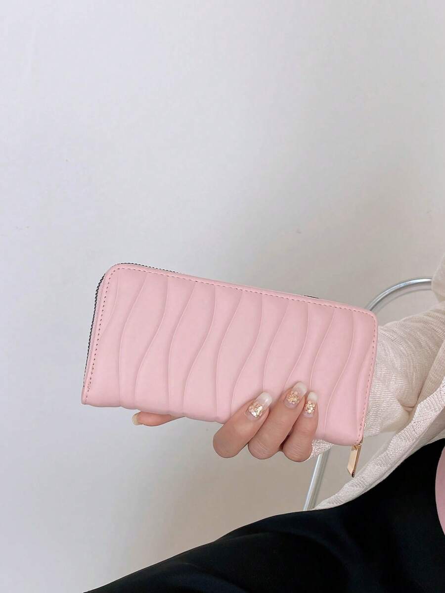 portefeuille fermeture éclair uli rose main