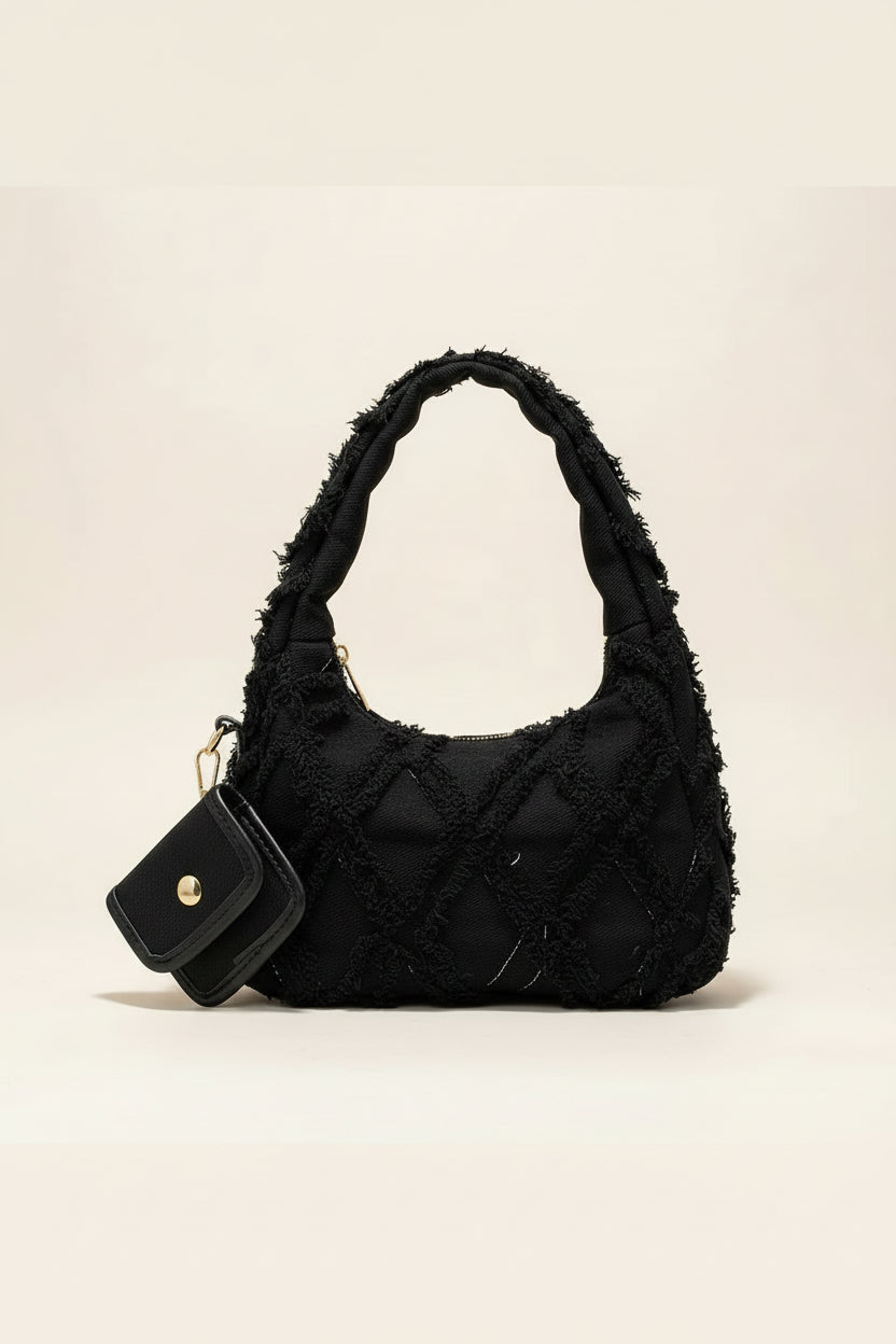 sac noir style effilochee brodee 