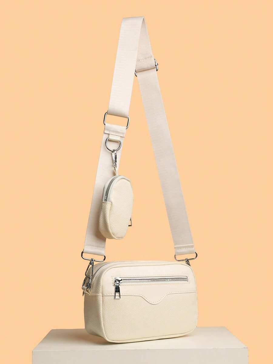 sacoche blanche uni avec mini sacoche accroche a la sangle blanche vu de profil