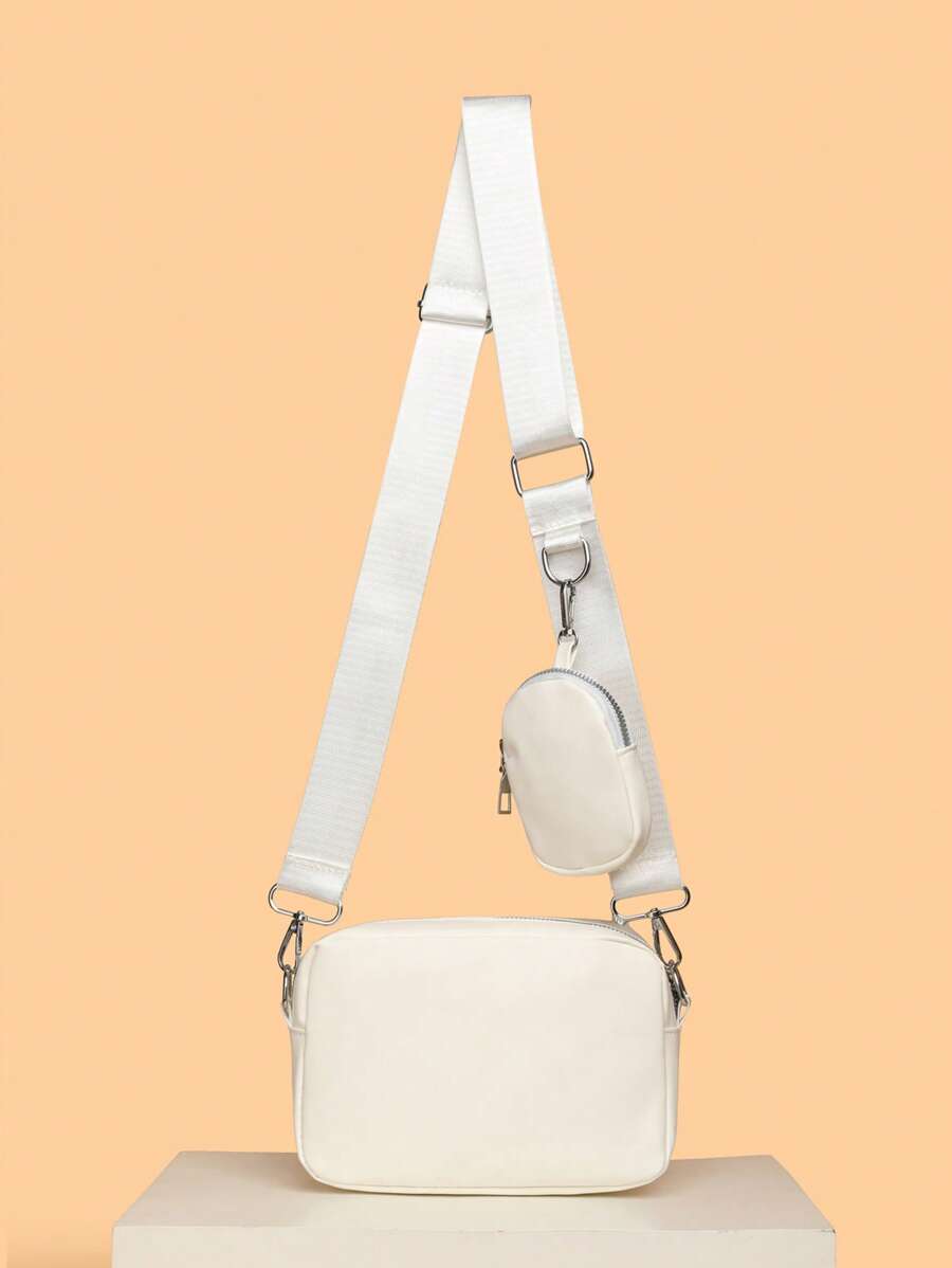 sacoche homme blanche motif avec petite sacoche vu de derriere avec mini sacoche accrochee